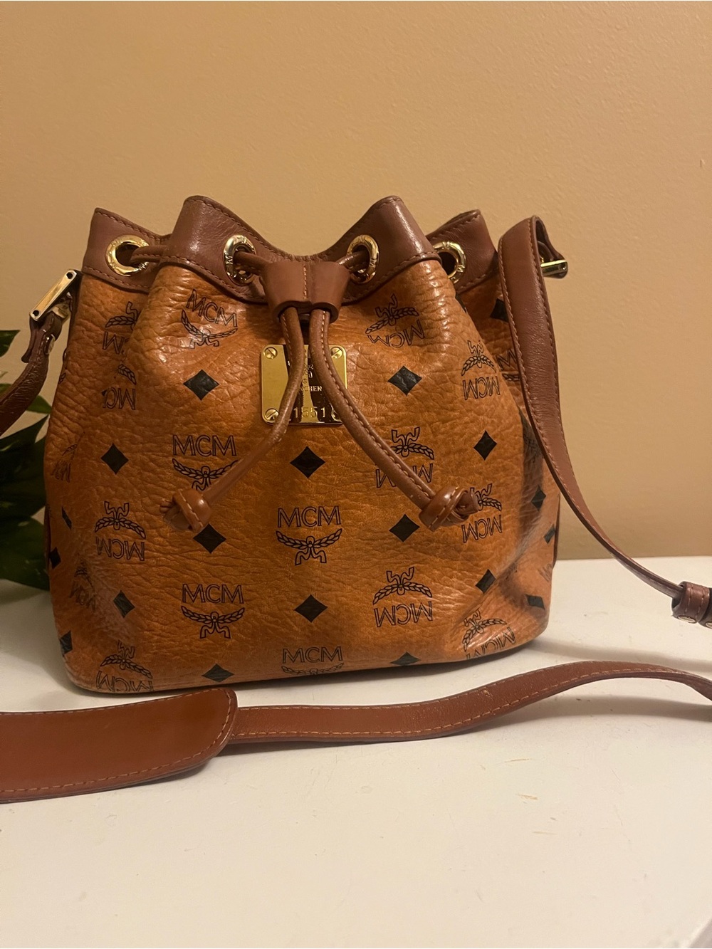 MCM Cognac Visetos Monogram Drawstring Bucket Bag…Small Crossbody/Shoulder bag.